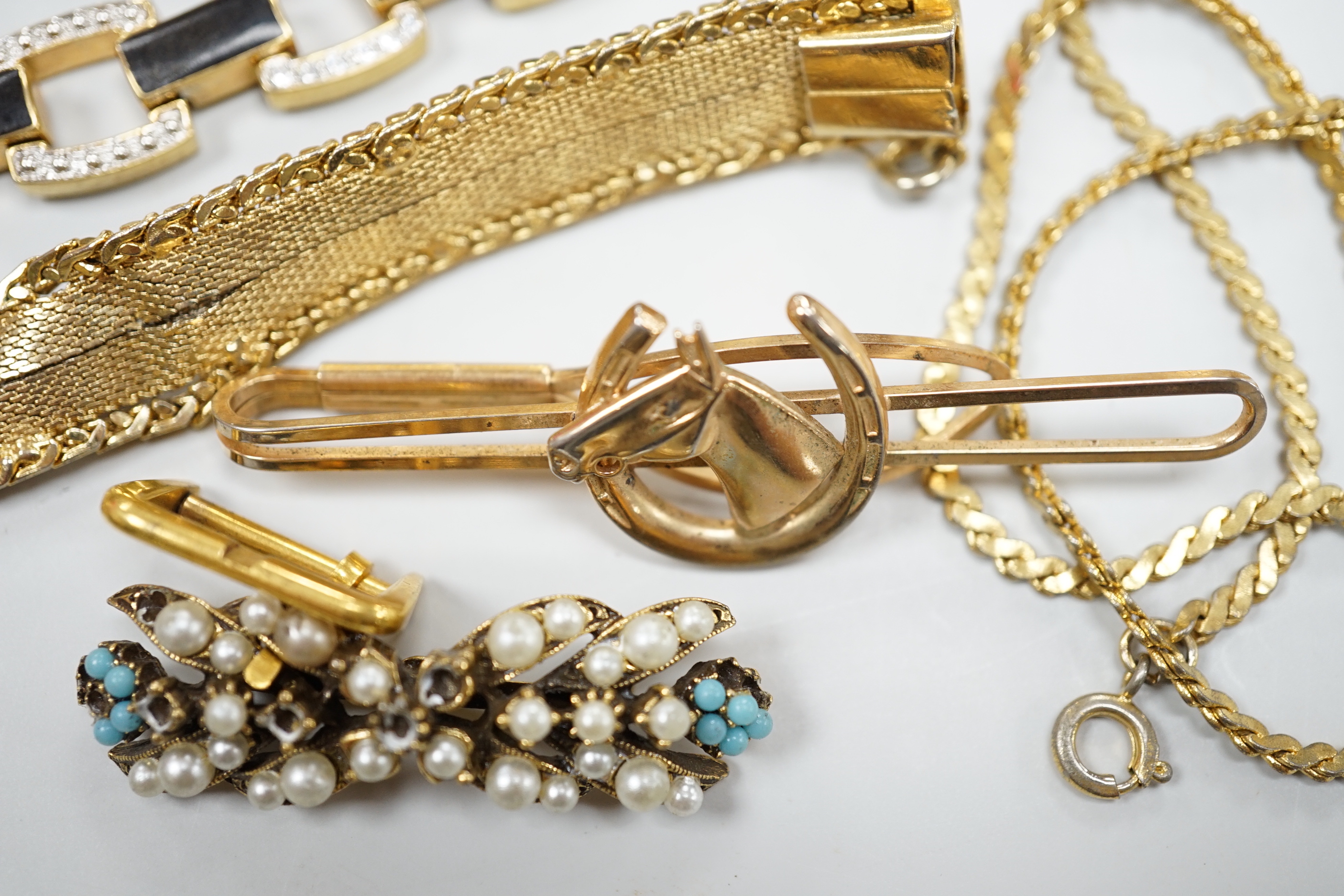 A group of assorted costume jewellery including a brooch in cameo corner leather case, and a small white card Cartier box